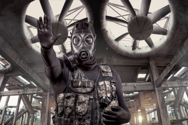 istock Gas mask wearing lone soldier 1225854161