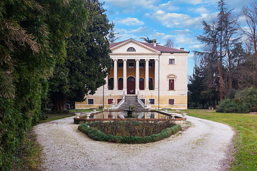 Bertesina (Vicenza), Italy - February 08, 2017:The villa, dating back to the early eighteenth century, is located along the road that connects the suburbs of Bertesina and Ospedaletto, in the countryside east of Vicenza. Described as one of the happiest examples of the Palladian heritage, the residence stands on a high plinth and reproduces the scheme of the central plan, with a built-in pronaos, a rear lounge and modular corner rooms. The villa stands in the center of a brolo on the edge of which there is a chapel and a barchessa.