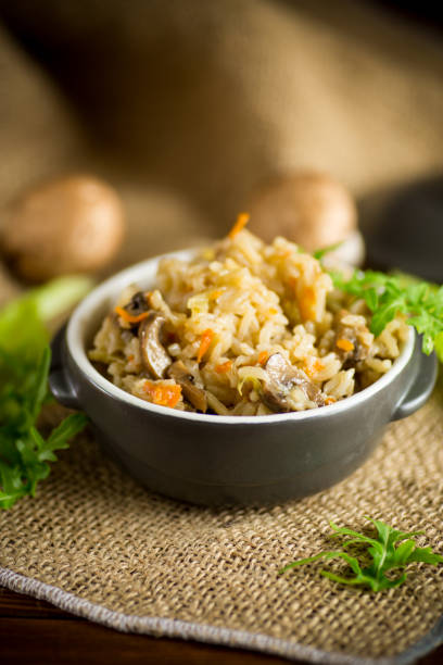 istock vegetarian cooked rice with mushrooms in a ceramic bowl 1225858886