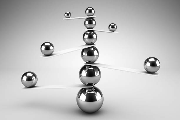 istock 3d render of carefully balanced spheres. Balance and stability concept 1225860246