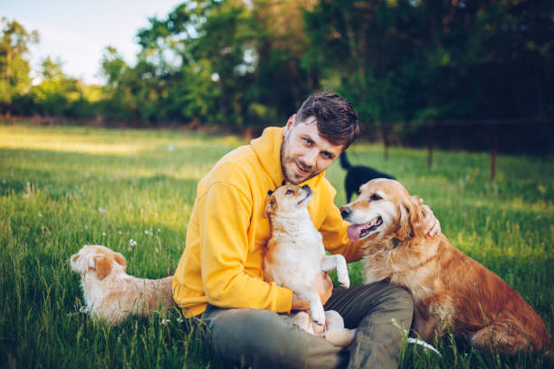 istock Guy and his dog, Golden Retriever, courtyard 1225860744