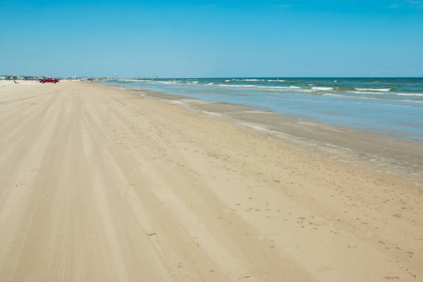 Sights to enjoy in a white sand summer beach Blue skies and white sand in the beaches of Galveston marie puddu stock pictures, royalty-free photos & images