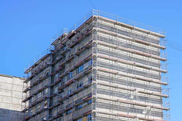 istock apartment house facade renovation and thermal insulation, scaffolding 1225861583