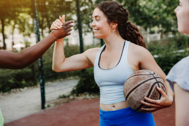 istock Female basketball team celebrating a win 1225862684
