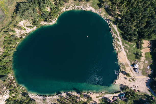 istock Heart shape lake in Trzebinia Poland aerial drone view 1225866133