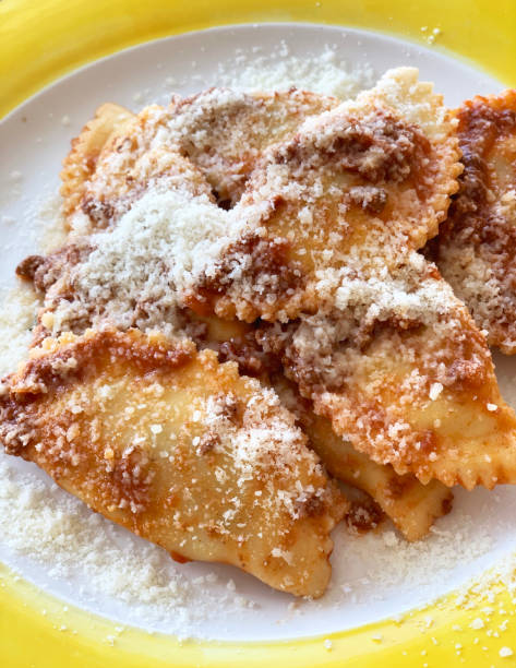 istock ravioli with bolognese sauce and parmesan 1225868167