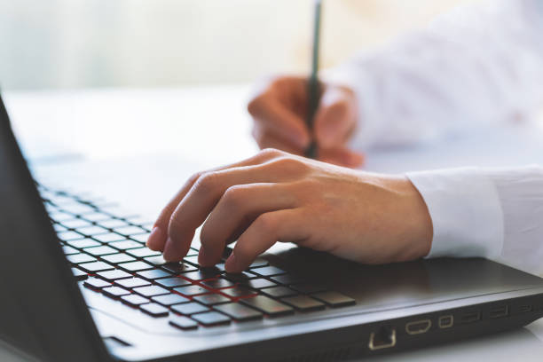 istock Female worker typing on the keyboard. Distance learning, education online. Online working from home, business and technology concept. Lockdown. 1225872684
