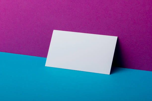 istock Business cards blank. Mockup on color background. Flat Lay. copy space for text 1225874580