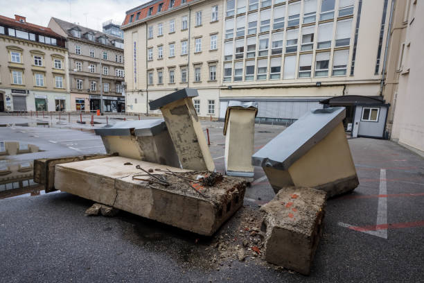 Damaged buildings in downtown of Zagreb after earthquake Zagreb, Croatia - April 16, 2020 : Damaged chimneys that was damaged by the earthquake of 5.5 on the Richter scale one month ago is lowered to the ground in downtown of Zagreb, Croatia. zagreb earthquake stock pictures, royalty-free photos & images