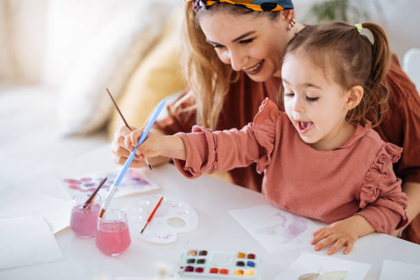 istock Young mother and daughter having fun time at home 1225875520