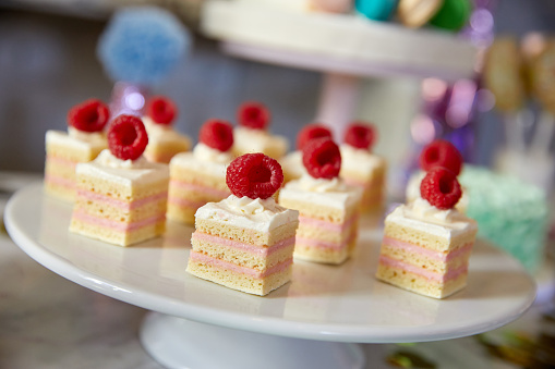Rasberry cakes on a dessert tray