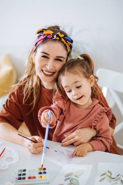 istock Young mother and daughter having fun time at home 1225875866