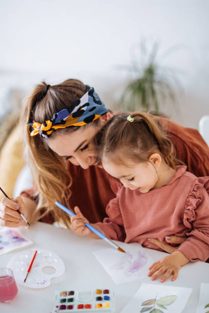 istock Young mother and daughter having fun time at home 1225876866