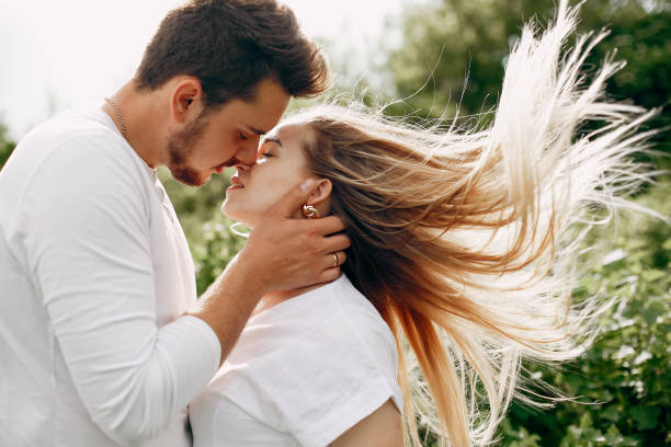 istock Beautiful couple spend time on a summer field 1225879265