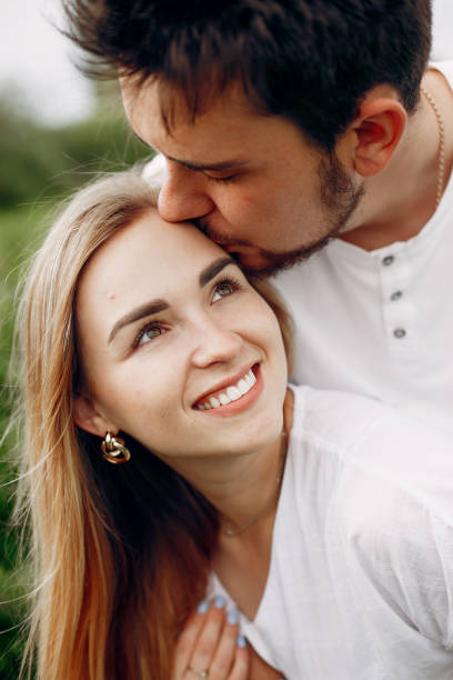 istock Beautiful couple spend time on a summer field 1225879272