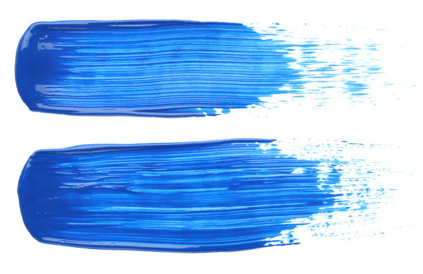 istock Two blue paint smears isolated on white 1225880216