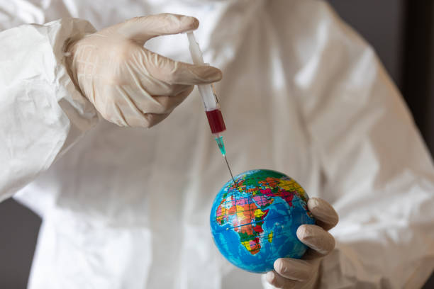 istock Vaccinating the world. Medical expert in the laboratory while making experiment for development covid19 vaccination 1225881130