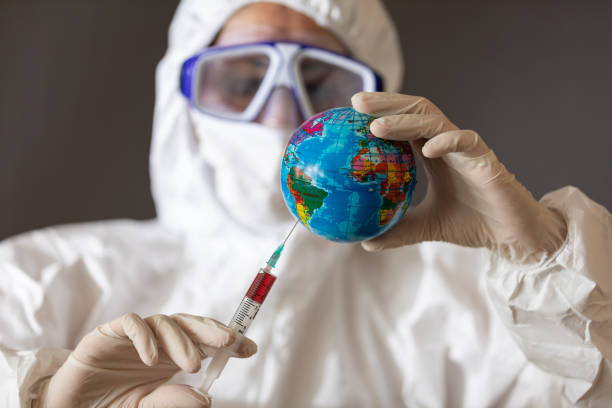 istock Vaccinating the world. Medical expert in the laboratory while making experiment for development covid19 vaccination 1225881312