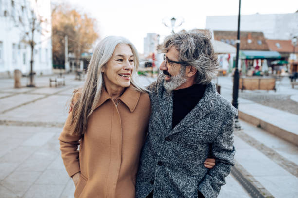 istock Happy senior couple walking together 1225884219