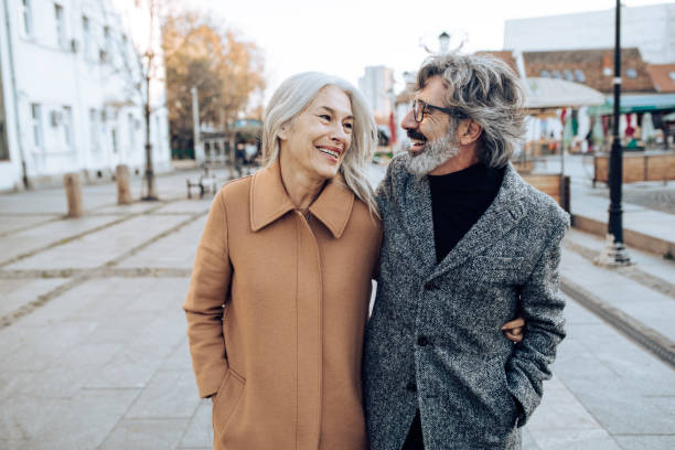 istock Seniors walking and enjoying together 1225884220
