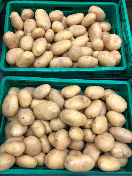istock Potatoes in boxes, food and retail concept 1225886045