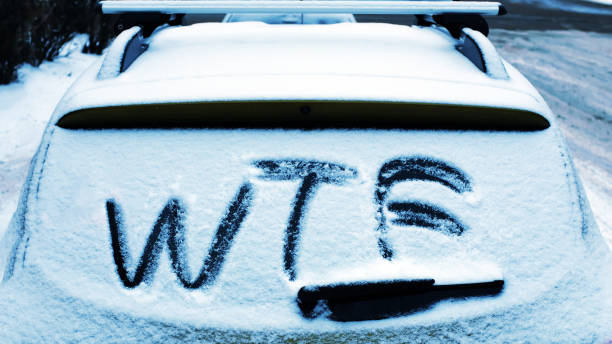 istock frozen car glass with the inscription  wtf 1225892421