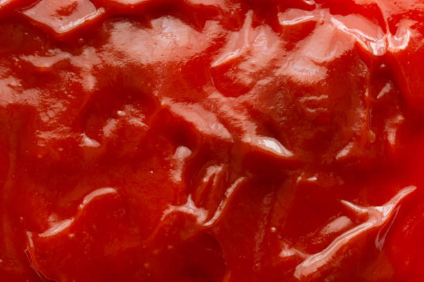 istock Tomato sauce ketchup texture background close up 1225892488