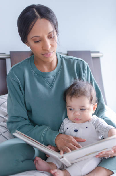 istock Story time with mom 1225892712