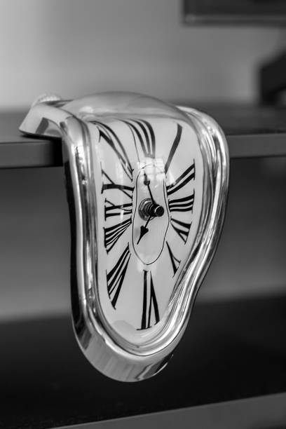 Black and white photo of the famous melting clock from Salvador Dalí’s painting “The Persistence of Memory”