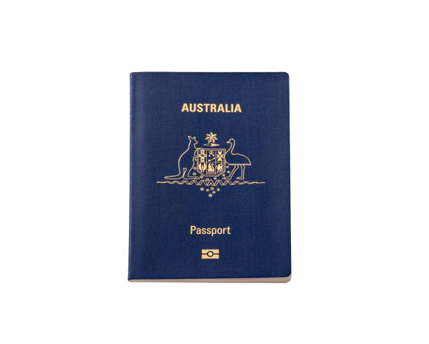 Australian Passport on a White Surface Blue Cover Document for Traveling Isolated passport stock pictures, royalty-free photos & images