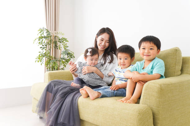 istock Children playing happily with family 1225897735