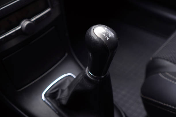 istock Manual transmission background with gear selector close up. 1225897985
