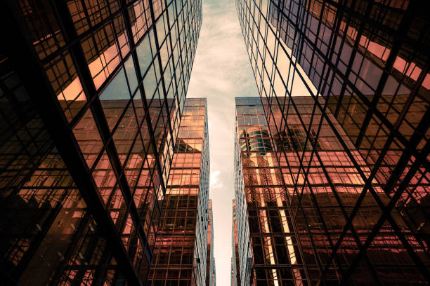istock Looking up at golden skyscrapers 1225905558