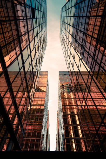 istock Looking up at golden skyscrapers 1225905561