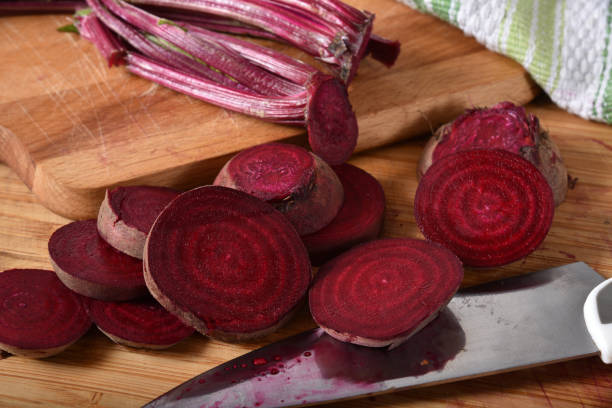 istock Sliced organic beets on a cutting board 1225911682