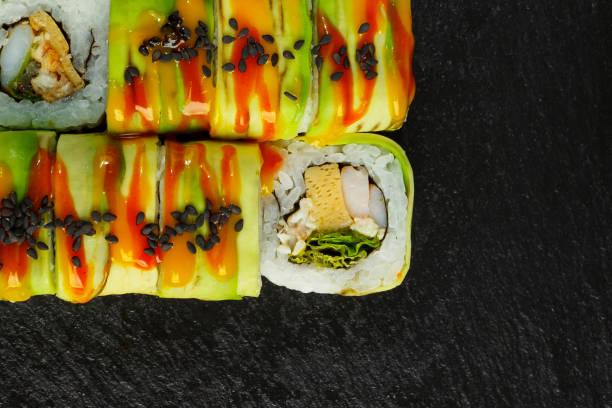 istock Japanese food: Set of salmon sushi and rolls with salmon and eel 1225920372