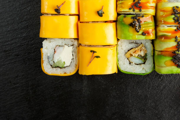 istock Japanese food: Set of salmon sushi and rolls with salmon and eel 1225922556