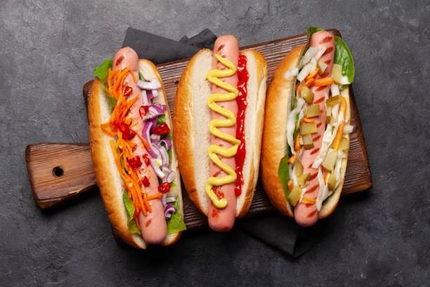 istock Various hot dog with vegetables, lettuce and condiments 1225923930