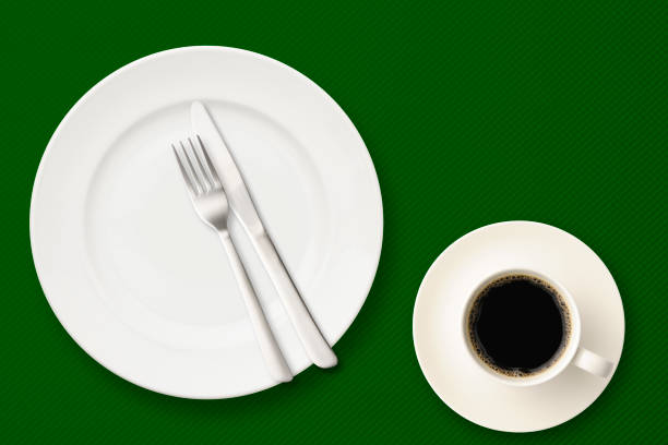 istock Coffee after meal on green tablecloth 1225926222
