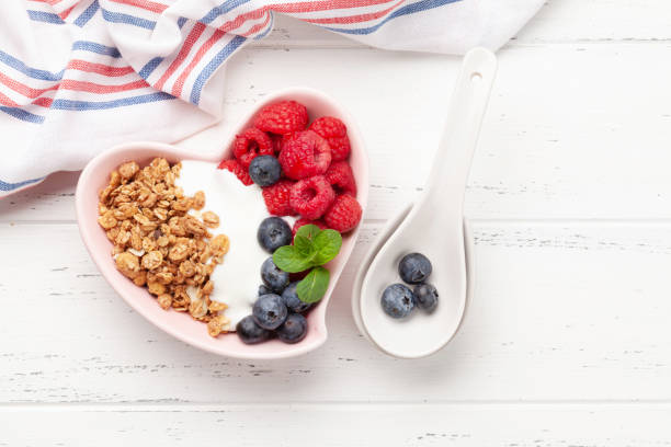 istock Healthy breakfast with granola, yogurt and berries 1225926542