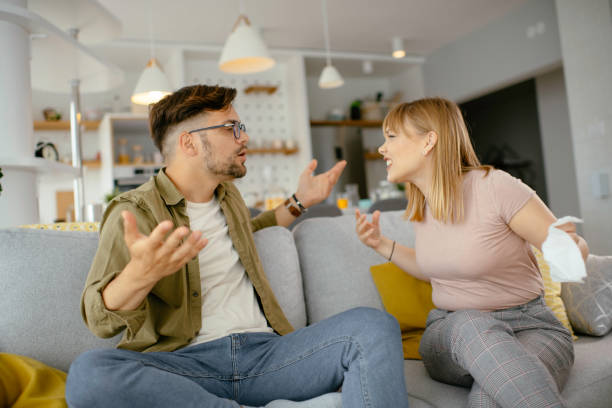 istock Boyfriend and girlfriend are arguing on the couch. 1225927429