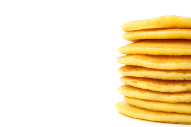 istock Tasty pancakes isolated on white background. Sweet breakfast 1225930171