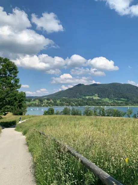 Path to Lake Tegernsee with a view of Gmund and the marina at Gut Kaltenbrunn, Upper Bavaria