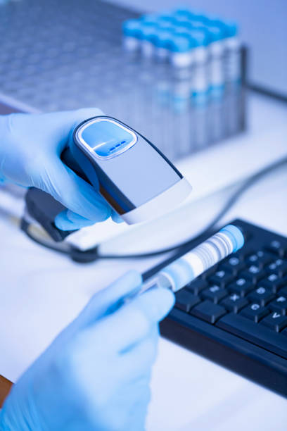 istock Doctor in Medical laboratory working test with medical samples  using modern equipment. Laboratory Medical Equipment Medical devices for analyzes. Tested for Coronavirus (COVID-19),  AIDS and definition of DNA, RNA virus. 1225935809