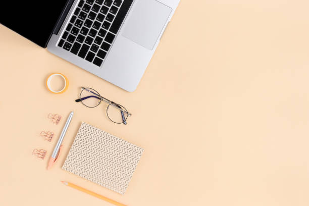 istock Layout of laptop, glasses and stationery. E-learning concept with copy space. 1225937032