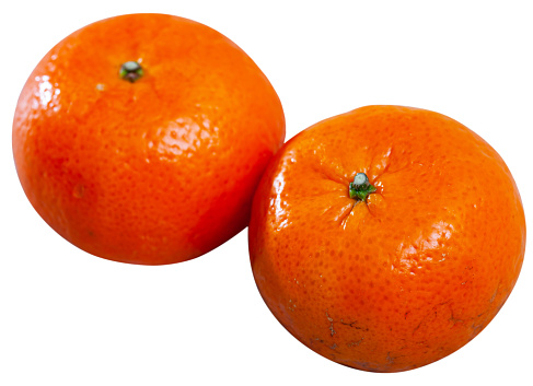 Ripe clementines. Isolated over white background