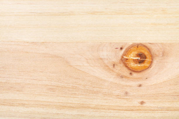istock wood board from two pine planks with knot close up 1225941691