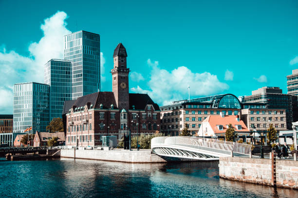 istock Malmo Canal Buildings And Clock Tower 1225941926