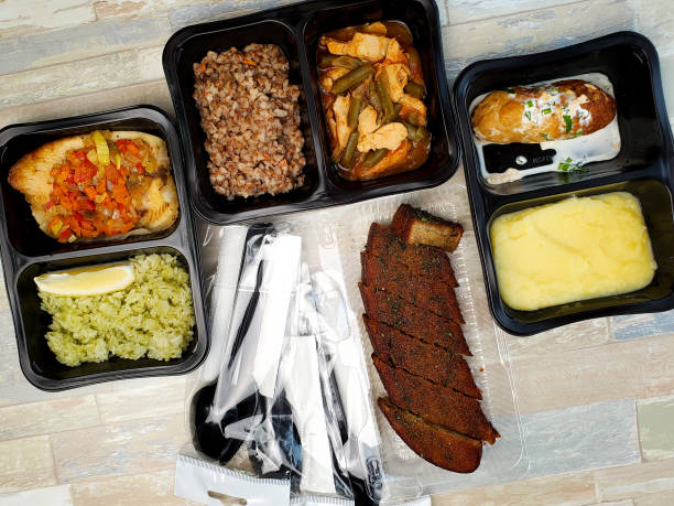 istock Plastic containers with delicious food on an isolated background. Delivery service 1225943548