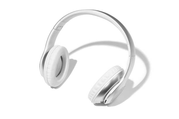 istock Wireless white headphones isolated on a white studio background with copyspace. Modern bluetooth technologies 1225948394
